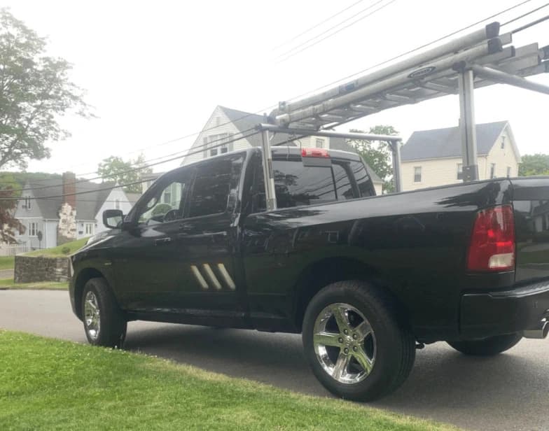 Fleet vehicle cleaning service being performed by Green Power Washing in Green